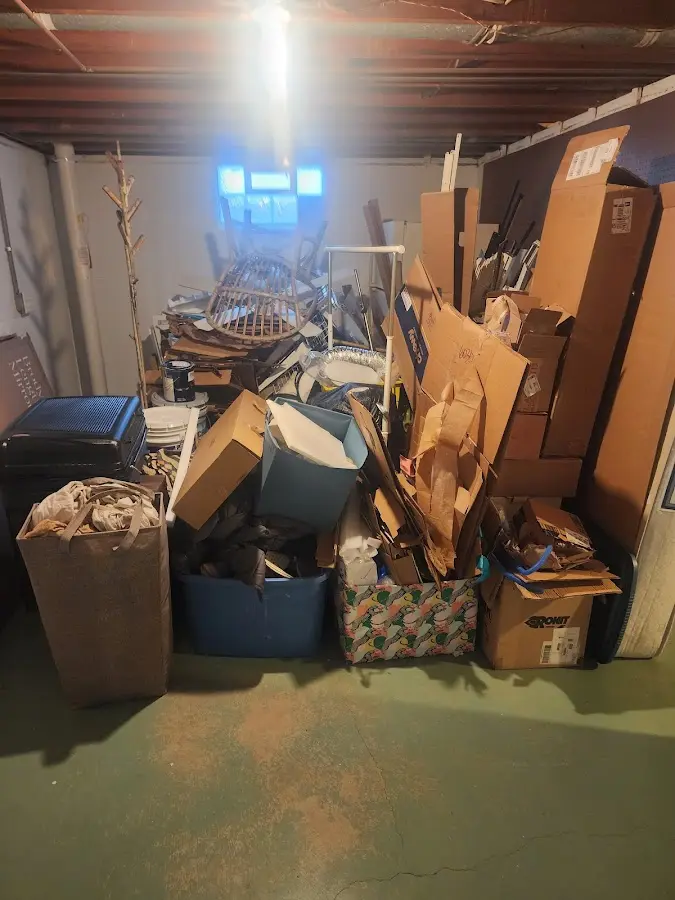 Roll-off dumpster container at job site for 2 Yard Dumpster Rental in Silvis